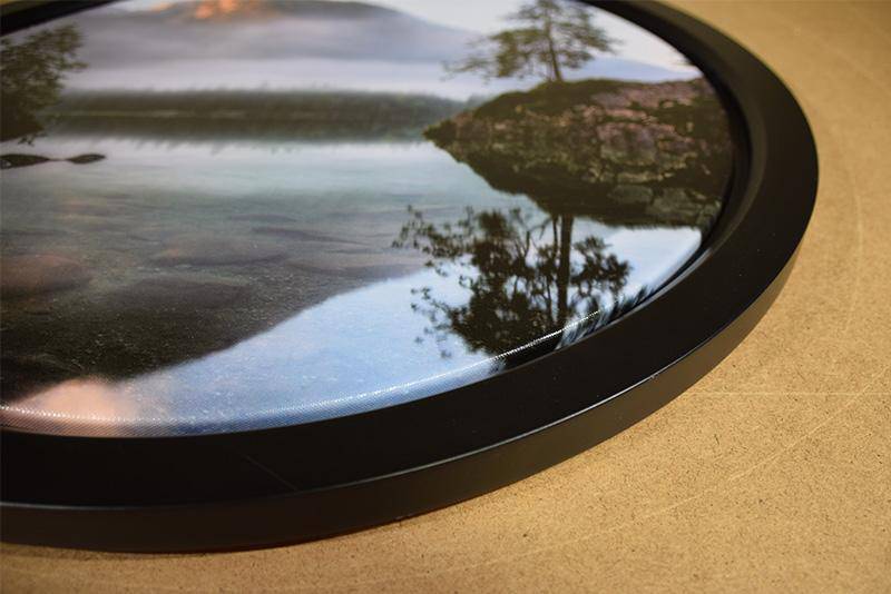 The Impress Round Framed Stretcher provides a professional, finished look to any print on canvas in a unique round format!